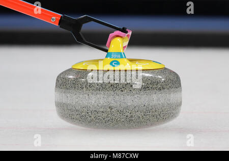 A stone during the match between Great Britain and China at the Gangneung Curling Centre during day six of the PyeongChang 2018 Winter Paralympics in South Korea. PRESS ASSOCIATION Photo. Picture date: Thursday March 15, 2018. See PA story PARALYMPICS Curling. Photo credit should read: Adam Davy/PA Wire. RESTRICTIONS: Editorial use only. No commercial use. Stock Photo