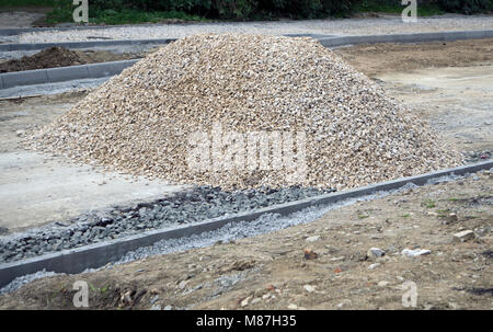 Piles of crushed stone isolate on white. Stock Photo
