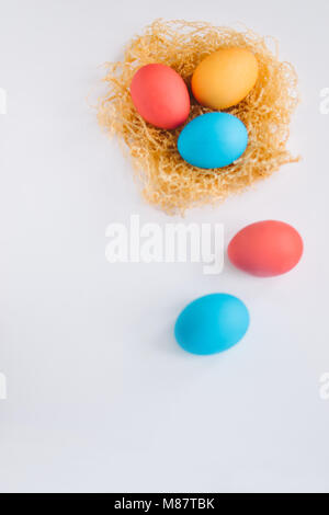 Stylish background of Colorful Easter eggs isolated on white. Dyed Easter eggs Stock Photo