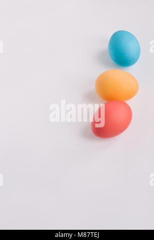 Stylish background of Colorful Easter eggs isolated on white. Dyed Easter eggs Stock Photo