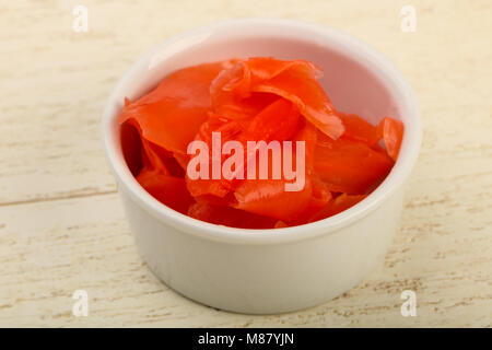 Picked ginger in the bowl over wooden background Stock Photo Alamy Picked ginger in the bowl over wooden background Stock Photo Alamy