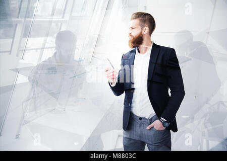 Businessman looks far for the future. Concept of innovation and startup Stock Photo