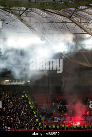 Bilbao, Spain. 15th March, 2017. Supporters of Olympique de Marseille with flares during 2017/2018 UEFA Europa League Round of 16 football match between Athletic Club and Olympique de Marseille at San Mames Stadium on March 15, 2017 in Bilbao, Spain. Credit: David Gato/Alamy Live News Stock Photo