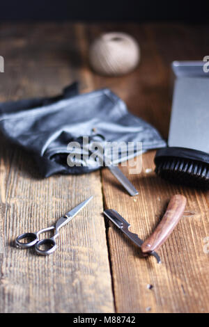 Vintage tools of barber shop on wooden background Stock Photo