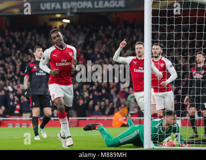 London, UK. 15th Mar, 2018. Danny Welbeck (2nd L) of Arsenal celebrates scoring during the UEFA Europa League round of 16 second-leg match against AC Milan at the Emirates Stadium in London, Britain on March 15, 2018. Arsenal beat AC Milan 3-1 and advanced to the quarterfinal with a 5-1 aggregate. Credit: Richard Washbrooke/Xinhua/Alamy Live News Stock Photo