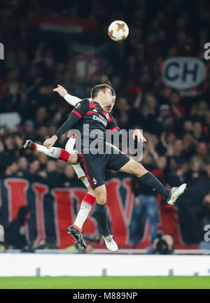 London, UK. 15th Mar, 2018. Giacomo Bonaventura (Front) of AC Milan vies with Hector Bellerin of Arsenal during the UEFA Europa League round of 16 second-leg match at the Emirates Stadium in London, Britain on March 15, 2018. Arsenal beat AC Milan 3-1 and advanced to the quarterfinal with a 5-1 aggregate. Credit: Richard Washbrooke/Xinhua/Alamy Live News Stock Photo