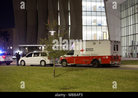 Miami, USA. 15th Mar, 2018. An ambulance is seen on the campus of Florida International University after a deadly pedestrian footbridge collapse, in Miami, Florida, United States, on March 15, 2018. A pedestrian footbridge near Florida International University (FIU) collapsed Thursday afternoon, causing 'several fatalities,' local authorities said. Credit: Monica McGivern/Xinhua/Alamy Live News Stock Photo