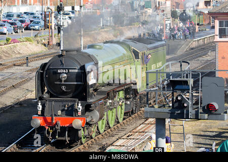 Kidderminster, UK. 16th March, 2018. Severn Valley Rail enthusiasts enjoy taking pictures and travelling on the steam rail line that runs from Kidderminster to Bridgnorth, marking the start of the Severn Valley Railway Spring Steam Gala. With sunshine in abundance, plenty of people are indulging in an era when travel on locomotives such as the Tornado and King Edward II seemed extravagant. Credit: Lee Hudson/Alamy Live News Stock Photo
