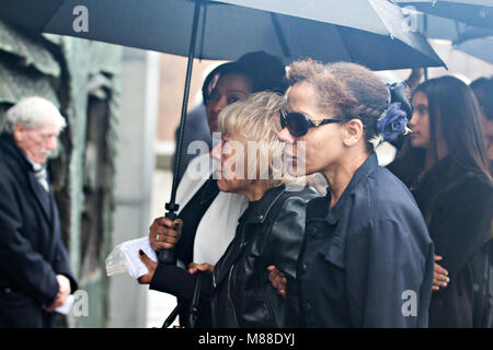 Liverpool, UK. 16th March 2018. Wife and daughters of Eddy Amoo from the Real Thing group attend his funeral at Liverpool Metropolitan Cathedral. Credit: Ken Biggs/Alamy Live News. Stock Photo