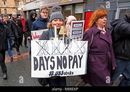 Glasgow, Scotland, UK. 16th March, 2018. Several hundred university lecturers and students from Glasgow University demonstrated in the city centre in support of the official industrial action against the reduction in pension payments being made to university staff and lecturers. This day of action in Glasgow is only one of a number taking place across Britain at other universities and colleges called by the lecturers Trades Union. Credit: Findlay/Alamy Live News Stock Photo