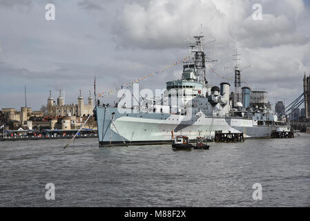 Thames, London, UK. 16th March 2018. HMS Belfast which is moored near to Tower Bridge celebrates its 80th birthday this weekend. Credit: Matthew Chattle/Alamy Live News Stock Photo