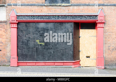 Boarded-up shop front in the industrial town of Walsall in the West Midlands Stock Photo