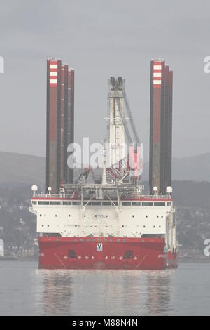 TIV MPI Adventure, a turbine installation vessel operated by MPI Offshore, off Greenock Esplanade on the Firth of Clyde. Stock Photo