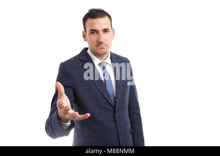 Confused businessman asking demanding  questions explanations isolated on white background with copyspace Stock Photo