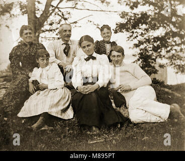 Antique circa 1905 photograph, family group photograph. Location is in or near Riggsville (now Robinhood), Maine in Sagadahoc County, USA. Stock Photo