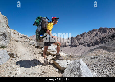 CA03406-00...CALIFORNIA - Tom Kirkendall hiking near Forester Pass on the John Muir Trail in Kings Canyon National Park. (MR# K1) Stock Photo