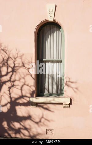 Morning sunlight shines on a Victorian house window in Melbourne, Australia. Stock Photo