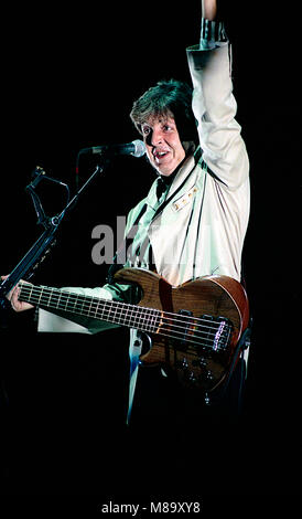 Washington DC. USA, July 4, 1990 Paul McCartney performs at the Fourth of July concert in the Robert F. Kennedy football stadium. Credit: Mark Reinstein/MediaPunch Stock Photo