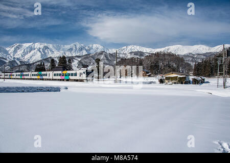 Passing Azusa Express Snowfall in Hakuba village, Nagano Prefecture, Japan Stock Photo