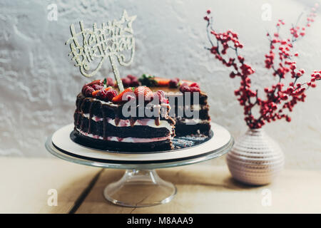 Cake with Happy Birthday sign Stock Photo