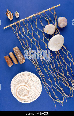 Abstract composition of nautical elements on the blue background, flat lay Stock Photo
