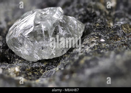 natural diamond nestled in kimberlite Stock Photo