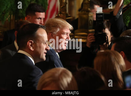 US President Donald Trump and Irish Taoiseach Leo Varadkar (left) attend the annual shamrock presentation ceremony at the White House in Washington DC, USA. Stock Photo