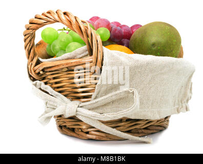Grapes, pears and other fruits in the basket on a white background Stock Photo