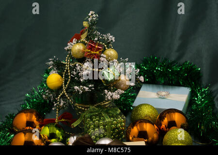 Beautiful decorations around the Christmas tree Christmas tree, happy New Godemichet about Golden toys, balloons, flowers, Stock Photo