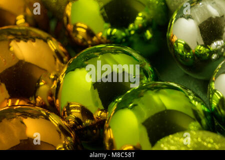 Multi-colored Christmas balls - red, orange, blue, purple and green as a background Stock Photo