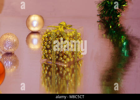 A New Year, Christmas. Christmas decorations, multi-colored balls and gifts with a Christmas tree Stock Photo
