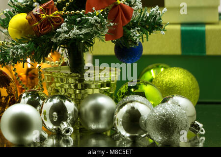 Close-up of beautiful Christmas gifts. Christmas surprises. Gifts with Christmas balls. Stock Photo