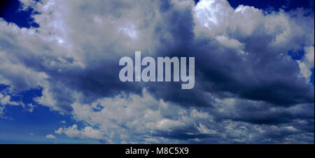 stormy clouds in blue sky Stock Photo