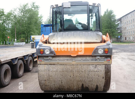 Close view on the road roller working on the new road construction site.repair Stock Photo