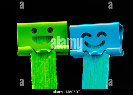 close up two binder clips on Ice cream sticks Stock Photo