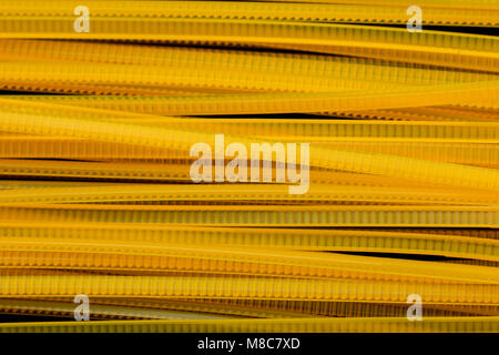 Yellow Nylon Cable Ties on black Background Stock Photo