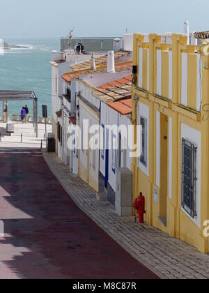 ALBUFEIRA, SOUTHERN ALGARVE/PORTUGAL - MARCH 10 : Typical Street Scene in Albufeira Portugal on March 10, 2018. Unidentified people Stock Photo