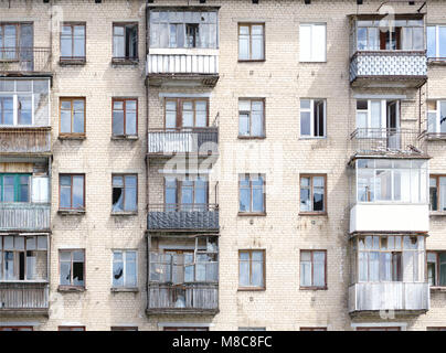settled crumbling buildings with broken Windows Stock Photo