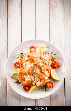 Shrimps with white rice and vegetables Stock Photo
