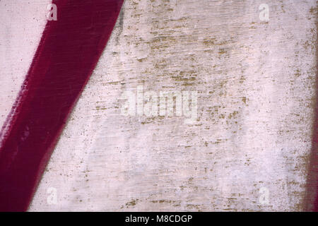 Closeup light beige texture walls.with a red stripe Stock Photo