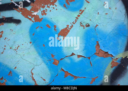 texture turquoise blue cracked wall, old texture of the paint chips and cracks of destruction. Grunge wall texture for design Stock Photo