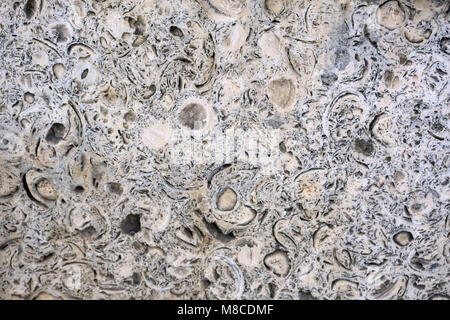 Close up background texture of cutting layers of weathered granite cliff erosion is a long time. Stock Photo