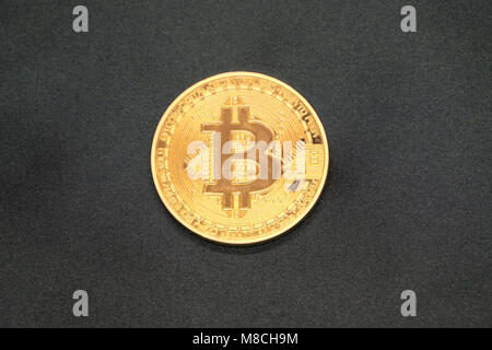 Five Virtual Coins Bitcoins On Printed Circuit Board. Stock Photo