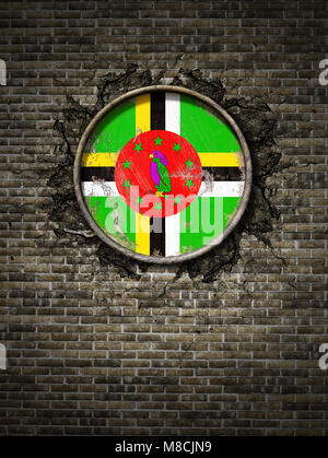 3d rendering of a Dominica flag over a rusty metallic plate embedded on an old brick wall Stock Photo