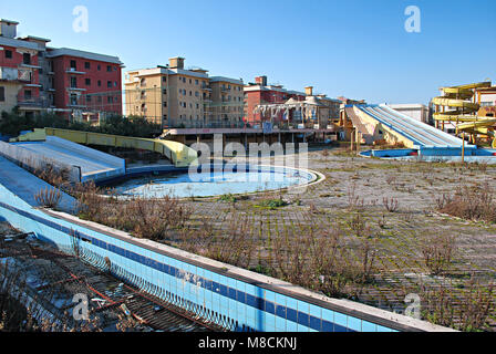 Swimming pool in Villaggio Coppola. The construction of the village is an example of illegal building on a large scale - Castel Volturno, Italy Stock Photo