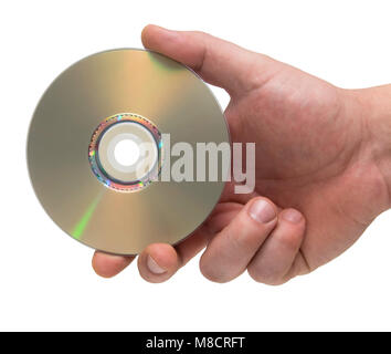 Male hand holding a blank disc. Isolated on a white background. Stock Photo