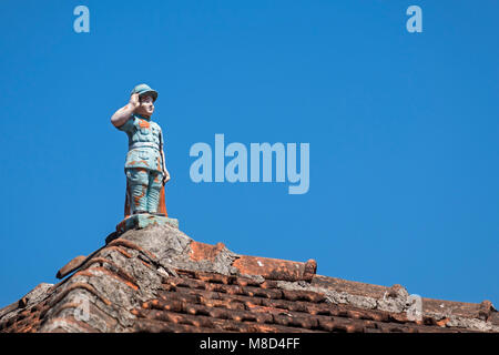 Portuguese soldier statue on house roof Fontainhas Panjim Goa India Stock Photo