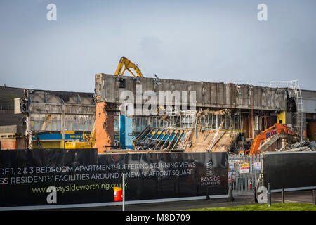 Demolition of the old Aquarena Swimming Pool in Worthing, West Sussex to make way for luxury seafront flats. Stock Photo