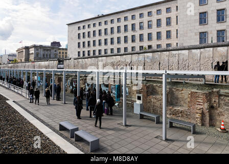 Tourists visit the Topography of Terror, an outdoor and indoor history museum on April 19, 2017 in Berlin, Germany. Stock Photo