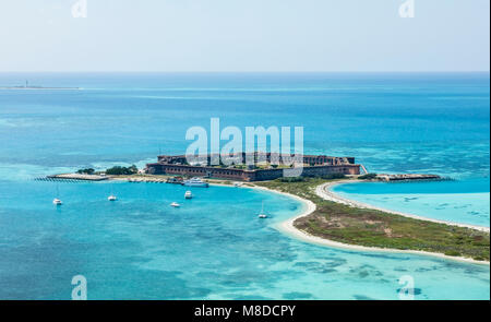 An aerial view of Fort Jefferson located on Garden Key, Dry Tortugas, Florida. In the distance is Dry Tortugas lighthouse located on Loggerhead Key. Stock Photo